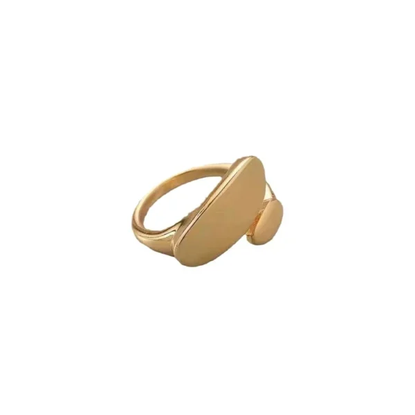 Open Ring with Asymmetric Oval Plaques